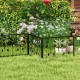 Decorative black garden fence with 8 interlocking panels, ideal for flower beds and animal barriers in outdoor spaces.
