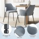 Curved backrest dining chair set in gray with wide seat, armrests, and adjustable foot pads for optimal comfort.