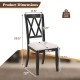 Curved cross back dining chair with beige upholstered seat, rubber wood legs, ergonomic design for comfort and support.