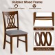 Walnut dining chair with ergonomic backrest, padded seat, and rubber wood frame for kitchen or living room use.