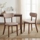 Set of 2 beige upholstered dining chairs with solid rubber wood frame, ideal for dining rooms and kitchens.