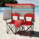 Double beach chair with adjustable canopy in red, featuring side shades, cup holders, and a central cooler bag for.