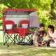 Double beach chair in red with adjustable canopy and side shading curtains, perfect for outdoor relaxation and sun.