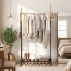 Double rods garment rack in gold and black with side hooks, bottom shelf, and stylish design for modern storage.