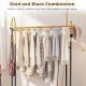 Double rods garment rack in gold and black with hanging clothes, side hooks, and bottom shelf for stylish organization.
