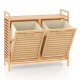 Double tilt-out laundry hamper in natural bamboo with two removable bins and top storage shelf for easy organization.