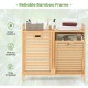 Double tilt-out laundry hamper with natural bamboo frame, featuring two removable bins and top storage shelf for.
