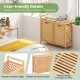 Double tilt-out laundry hamper in natural bamboo with two removable bins and top shelf for bathroom essentials.