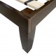 Close-up of the brown wooden bed frame leg, showcasing sturdy construction and modern design for a queen size mattress.