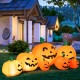 Inflatable Halloween pumpkin patch with LED lights, featuring multiple sizes for festive outdoor decoration.