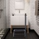 Heavy-duty step stool with non-slip platform and foam handle, supporting up to 330 lbs, ideal for bathroom use.