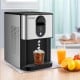 Self-dispensing nugget ice maker in silver, producing chewable ice cubes for refreshing drinks on a countertop.