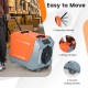 Commercial dehumidifier with pump, orange, featuring a collapsible handle and smooth rolling wheels for easy transport.