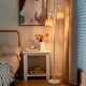 Two light tree trunk lamps with wicker shades in white, featuring a stable base and adjustable brightness for bedside.