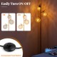3-globe floor lamp with foot switch, golden finish, featuring acrylic shades for soft light diffusion, ideal for homes.
