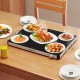 Electric warming food warmer with adjustable temperature, featuring a tempered glass surface, ideal for buffets and.