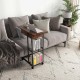 C-shaped end side table in rustic brown featuring a spacious top for laptops, with a lockable base for stability.
