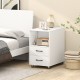 End table on wheels in white with built-in charging station, two drawers, and open shelves for versatile storage.