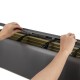 Hands adjusting the top panel of the GreyVolt Mini Split Air Conditioner, featuring a sleek gray design for efficient.