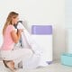 Portable 8lbs washing machine in purple, featuring a compact design and multiple wash programs for convenient laundry.
