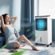 Portable evaporative air conditioner cooler with remote control, featuring a large water tank and customizable cooling.