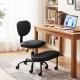 Ergonomic black office chair featuring a textured seat and curved low backrest for enhanced comfort and lumbar support.