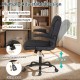 Ergonomic black leather office chair with flip-up armrests, adjustable height, and rocking function for comfort and.