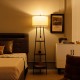 Standing shelf floor lamp featuring a durable linen lampshade and three open shelves, ideal for stylish bedroom.