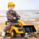 Child riding a yellow excavator digger toy with adjustable bucket, perfect for indoor and outdoor play.