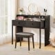 Black extendable computer desk with 2 storage drawers and lockable wheels, perfect for home office or vanity use.