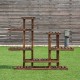 6-tier wooden shelf plant rack stand with a unique high-low design, perfect for showcasing plants and artworks outdoors.