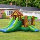 Kids inflatable jungle bounce house with slides and climbing wall, made of puncture-resistant 420D oxford fabric for.