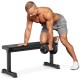 Flat weight bench with a 660 lbs capacity, featuring a thick cushion and anti-slip foot pads for stable workouts.