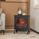 Black 1400W electric stove heater with 3-sided view and vivid flame effect, perfect for cozy living room decor.