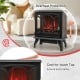 1400W electric stove heater in black with 3-sided view, featuring a vivid flame effect and overheat protection for.