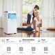 Portable 10000 BTU air conditioner in white with remote control, ideal for cooling, drying, and sleeping in small.