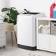 Compact full-automatic washing machine in white with 11 lbs capacity, ideal for apartments and dorms, featuring a.