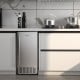 Under counter nugget ice maker in silver, featuring a sleek design, 80 lbs daily capacity, and self-cleaning function.