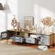 Farmhouse TV stand in oak and gray with 2 drawers, open compartments, and transparent doors for stylish media storage.