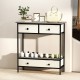 Farmhouse console table in gray with three drawers and open shelf, perfect for hallway storage and display.