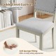Padded seat cushion of a grey farmhouse dining chair, featuring soft sponge filling for a comfy sitting experience.