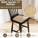 Well-woven PE rattan seat on a black rubber wood dining chair, offering comfort and vintage charm for dining spaces.