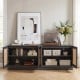 Farmhouse TV stand in black with PE rattan doors, adjustable shelves, and space for TVs up to 75 inches for stylish storage.