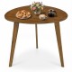 Round walnut dining table for 4 with rubber wood legs, ideal for cozy gatherings in dining rooms or cafes.