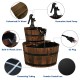 Two-tier outdoor wooden barrel waterfall fountain with carbonized wood, plastic liners, and decorative hand pump for.
