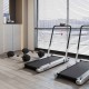3-in-1 folding treadmill and dumbbell weight set in a fitness room, featuring a 3HP motor and anti-slip running belt.
