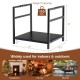 Firewood log rack in black with unique handles and raised feet, designed for indoor and outdoor use, holds up to 110.