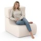 Curved beige floor chair with detachable headrest, ideal for relaxing, reading, or watching TV in any room.