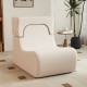 Curved beige floor chair with detachable headrest, made of ice velvet fabric, ideal for relaxing or reading.