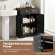 Black floor storage cabinet with doors, adjustable shelf, and gold handles, perfect for organizing bathroom essentials.